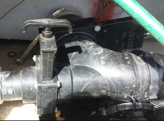 RV plumbing valve replacement during toilet service call