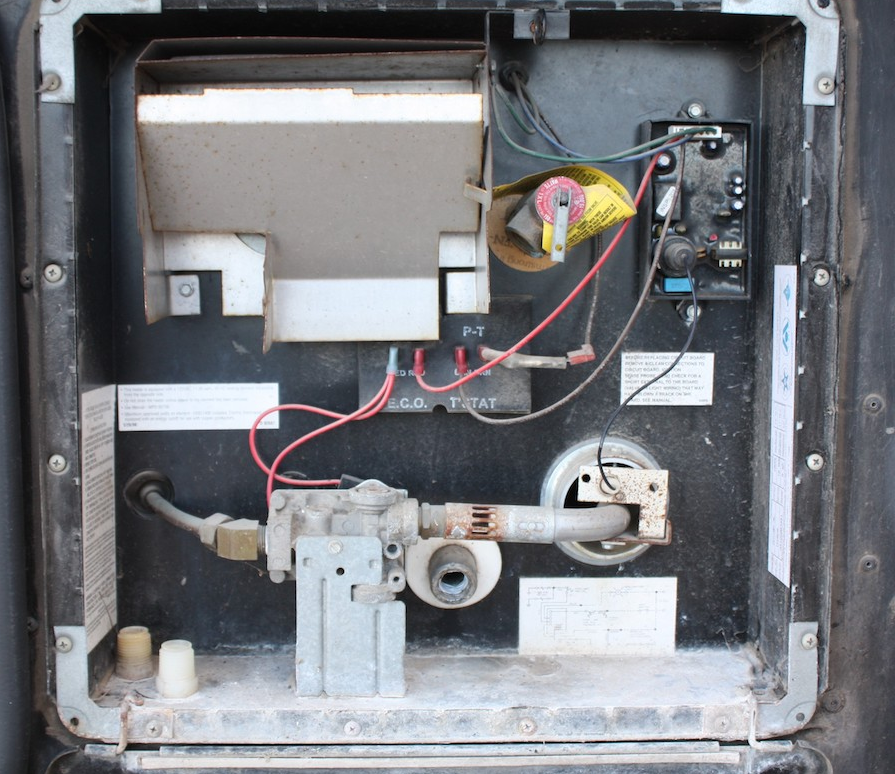 Mobile RV water heater repair technician servicing an RV in Port St. Lucie, Florida